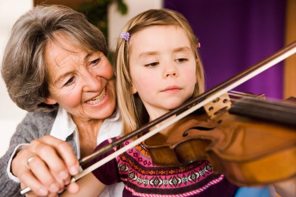 grandma-teaching-grandchild-music-2022-03-07-23-54-12-utc.jpg